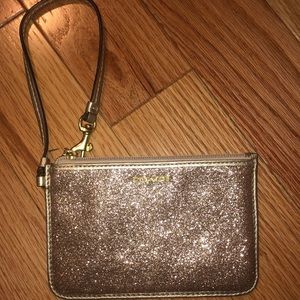 Coach gold sparkle wristlet